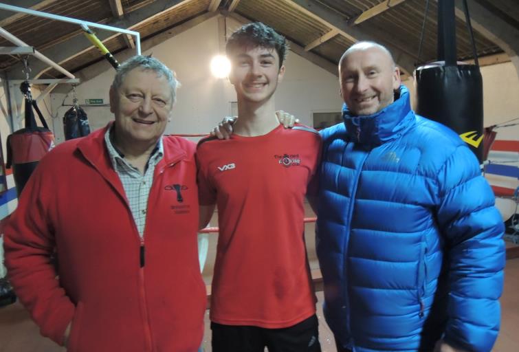 Joseph with coaches Rowland George and Ken Owen